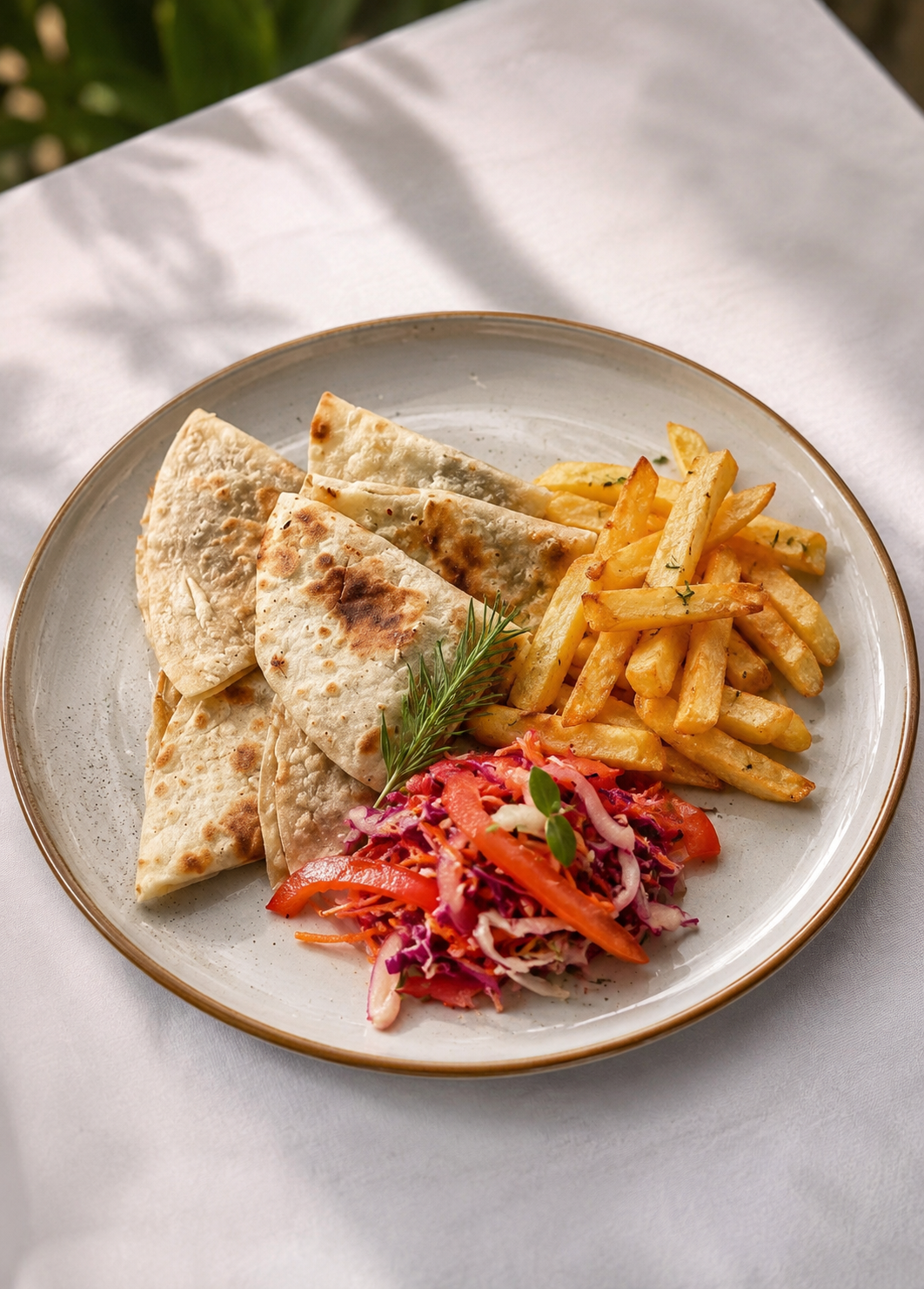 Quesadilla platter with fries and salad at The Island Kitchen